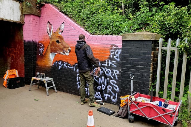 Members from BRINK Contemporary Arts have been working on the mural.