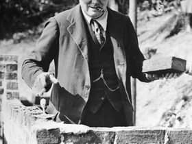 Winston Churchill carrying out some brick work at his home in Chartwell, Kent, in 1928 (photo: Getty Images)