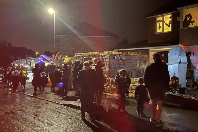 Hundreds of trick or treaters went to the House of Halloween. Photo by Darren Butler