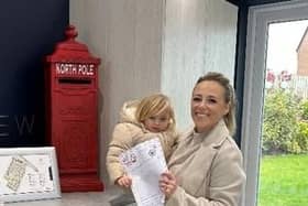 One of the young residents sends a letter to the North Pole...with a little help from mum.