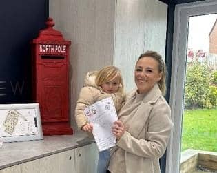One of the young residents sends a letter to the North Pole...with a little help from mum.