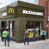 Delivery riders queue up outside a McDonald's restaurant in east London after the restaurant opened for delivery only orders (Photo: DANIEL LEAL-OLIVAS/AFP via Getty Images)