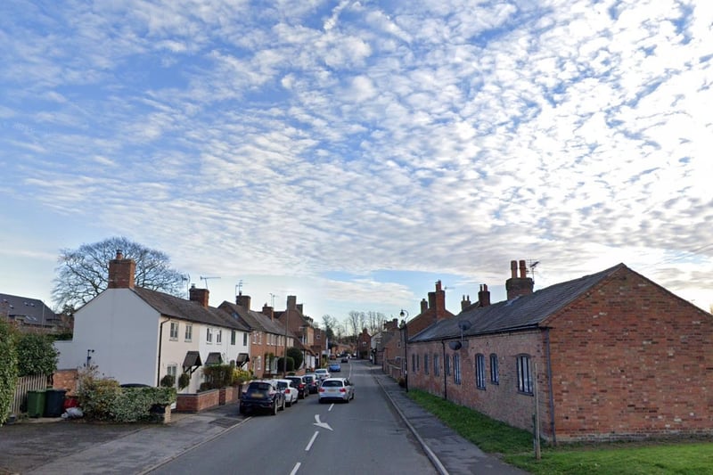 Property Price Median (year ending September 2023): £414,746 Property Price Median (year ending September 2024): £382,500  Photo shows Bridge Street in Barford.