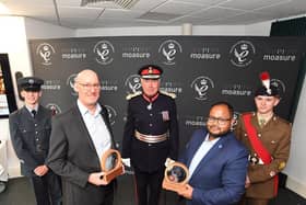 Front row from left: Alan Rock and Mo Hussain, co-CEOs of Moasure, with their King’s Awards
