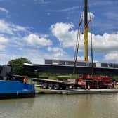 Boats are craned in ahead of the show.