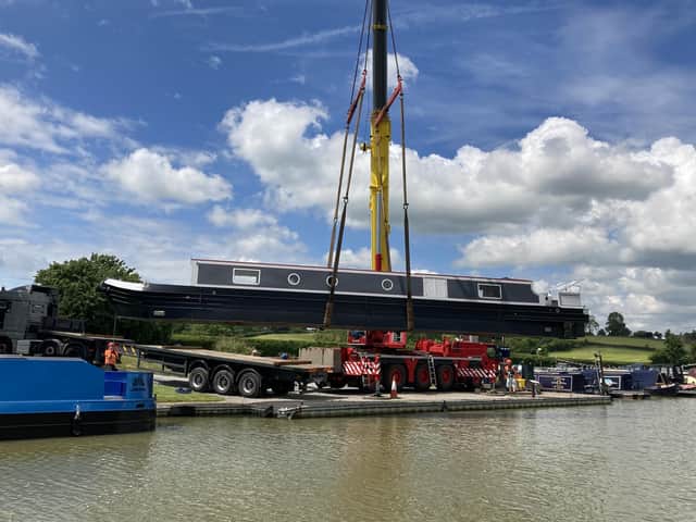 Boats are craned in ahead of the show.