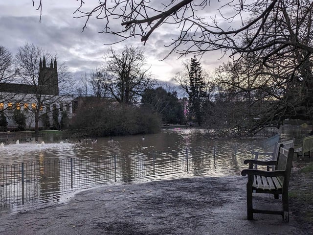 Jephson Garden benches in floods around the pool.