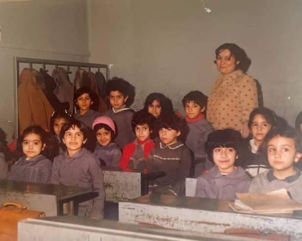 Early promise: Elham Fardad (far left) on her first day at school in Iran