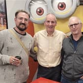 Chris Barrie, who played Rimmer, the pompous hologram in the cult comedy Red Dwarf, at the Rugby launch with father and son fans Benjamin Taylor and dad Colin Taylor.