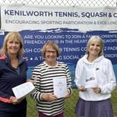 Pictured from left to right are Shirley Whiting, Kay Gebbels and Mel Jennings with copies of the history book.