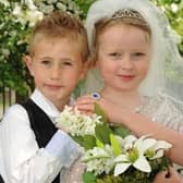 The bride and groom celebrate their special mock wedding at Dunchurch Infant School and Nursery.