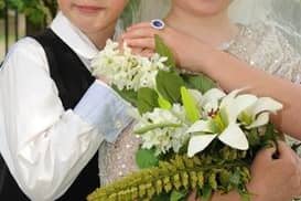 The bride and groom celebrate their special mock wedding at Dunchurch Infant School and Nursery.