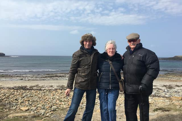 Garry, Lilian and Robin Delday had to wait for more than ten hours for an ambulance to arrive after Lilian broke her hip in a fall  at her home in Warwick.  Picture supplied.