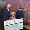 Local franchisee Glyn Pashley and OurJay Foundation unveil the new defibrillator machines.