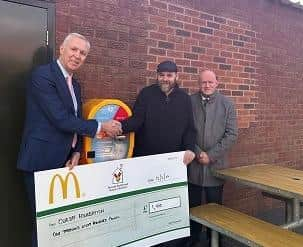 Local franchisee Glyn Pashley and OurJay Foundation unveil the new defibrillator machines.