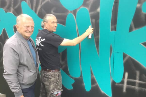 Designer, Tim Rowbottom, Brink Contemporary Arts (right), demonstrates to David Howells, chairman of Art Friends Warwickshire (left), the technique to be used for the mural the group will fund this autumn. Picture supplied