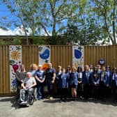 Campion School children, who created the artwork, with Allsopp Ward staff and patient Andrew Whiteford and his family. Photo supplied