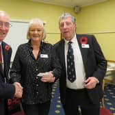 Warwick Rotary Club President Keith Talbot (left) with Lynne and Alan White from Galanos House in Southam. Photo supplied