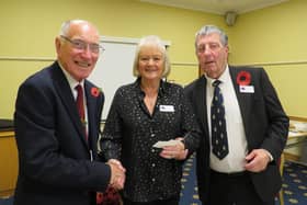 Warwick Rotary Club President Keith Talbot (left) with Lynne and Alan White from Galanos House in Southam. Photo supplied