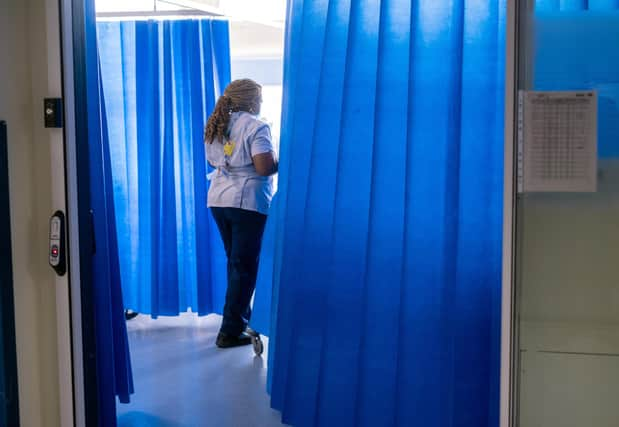 A general view of staff on a NHS hospital ward at Ealing Hospital in London. Picture date: Wednesday January 18, 2023.