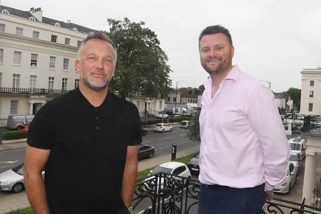 CAPTION: Jamie Connolly (left) with Jonathan Blood on the balcony of 19 Waterloo Place. Picture supplied.