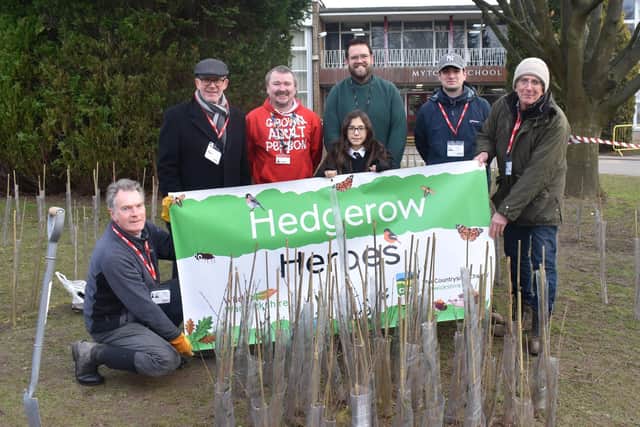 Warwick and Leamington MP Matt Western visited Myton School to ceremoniously plant the final ‘whip’ of the hedgerow. Picture supplied.