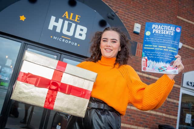 The Ale Hub in Warwick, is doing a festive drive for a charity called practical presents, with a collection box for customers to donate.  Pictured: Grace Pratt - bar manager. Photo by Mike Baker