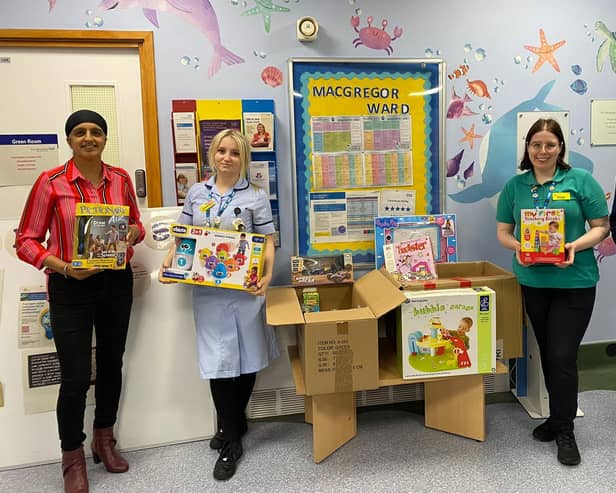 Warwickshire charity Langar Aid has made a generous donation of toys to the young patients at Warwick Hospital’s Macgregor Ward. Picture supplied.