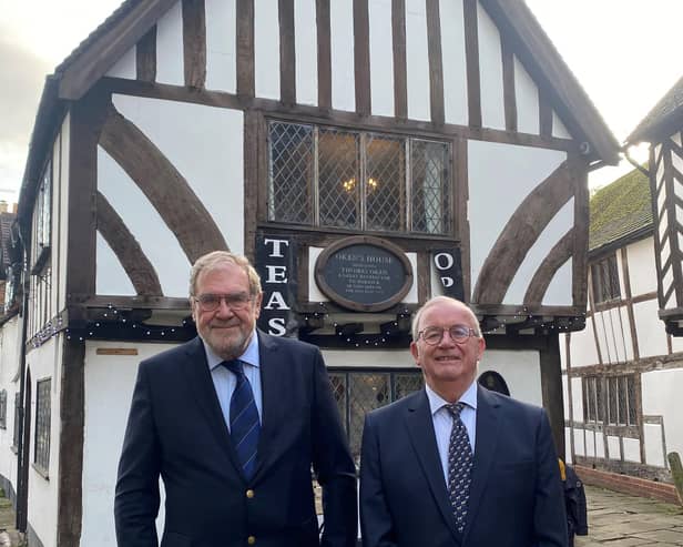 Clive Mason (right), chairman of the Charity of Thomas Oken and Nicholas Eyffler, and Terry Brown, a trustee and chairman of the Oken Feast committee, outside Oken House in Castle Street, Warwick, where Thomas Oken died 450 years ago. Photo supplied