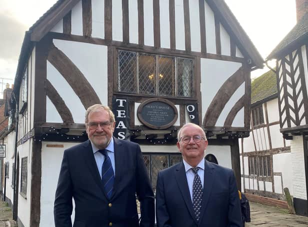 Clive Mason (right), chairman of the Charity of Thomas Oken and Nicholas Eyffler, and Terry Brown, a trustee and chairman of the Oken Feast committee, outside Oken House in Castle Street, Warwick, where Thomas Oken died 450 years ago. Photo supplied
