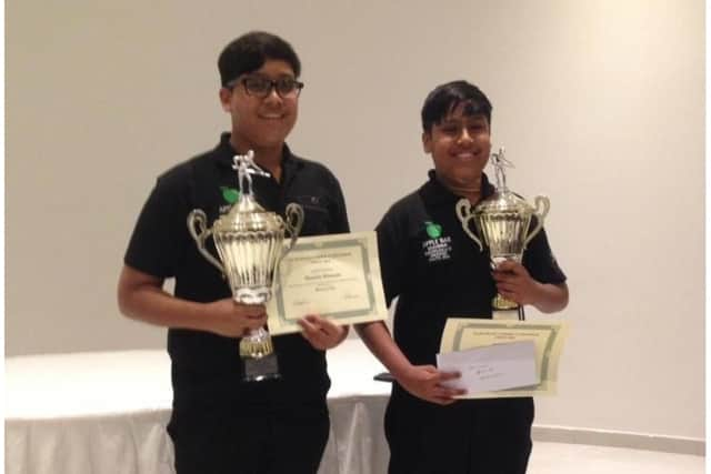 The brothers aged 11 and 10 with trophies. Photo supplied