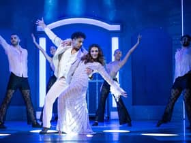Robby Khela as Vicky, Pia Sutaria as Mala and the Bombay Superstar ensemble. Photo: Nicola Young