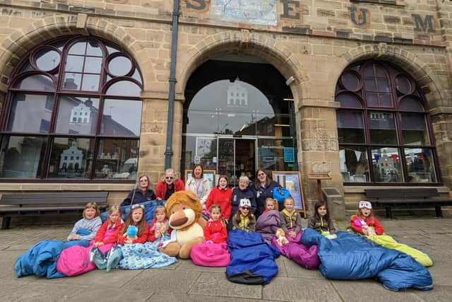 From left - Gill Eyers-Hunt, Moira Allen-Donald, Rachel Ollerenshaw, Eva Brown (young leader), Julie Brown and Sophie Glennon-Brown with members of the Rainbows. Photo supplied