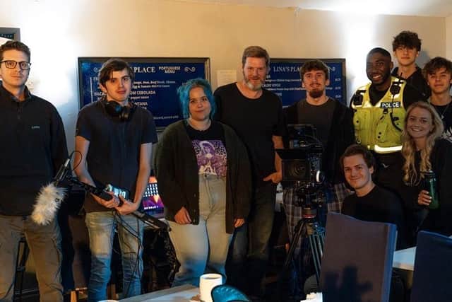 The cast and crew on the set of Baby on Board