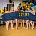 Kerry Prosser, Tina Gillespie, Samantha Edwards (barmaid), Shannon Bentley (barmaid), Roxi Chalk (barmaid), Hannah Oliver, and Stephanie Reid, are featured on the calendar page for January.