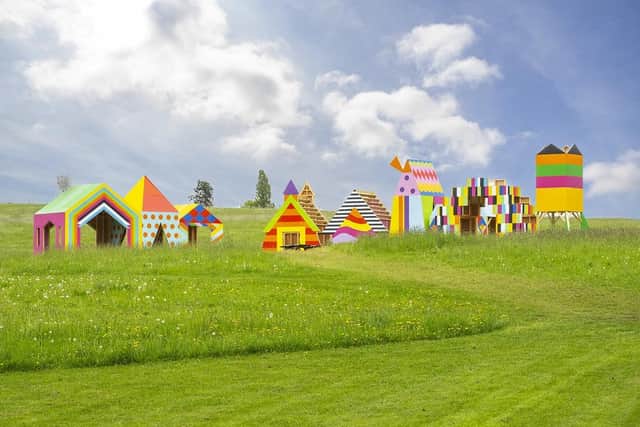 At Compton Verney visitors can see Morag Myerscough’s new outdoor installation, The Village, in the Old Town Meadow – the site of the medieval village of Compton Murdak. Photo by Compton Verney