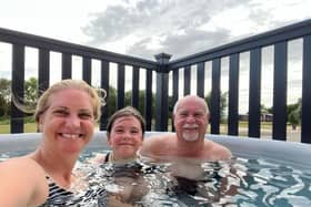 Alan Wooding and his companions enjoy the hot tub