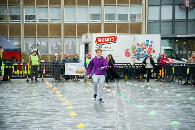 Warwick town centre, played host to the annual 'Pancake Race' this week.  Photo shows the adults' races.