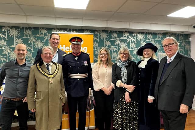 In recognition of the recent Kings Award for Voluntary Services, The Lord-Lieutenant for Warwickshire, as The King's representative, presented the Helping Hands Community Project with a certificate and a commemorative crystal at a ceremony. Photo supplied
