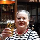 Competition winner, Sara Axling-Youds, celebrating with a Carlsberg Brooklyn Pilsner