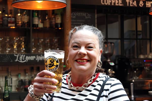 Competition winner, Sara Axling-Youds, celebrating with a Carlsberg Brooklyn Pilsner