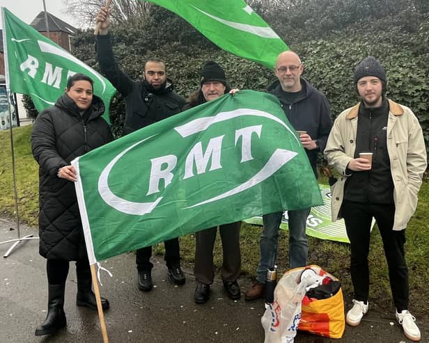 Members of the RMT union opposite the main entrance to Rugby station this morning, Tuesday, January 3.