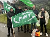 Members of the RMT union opposite the main entrance to Rugby station this morning, Tuesday, January 3.