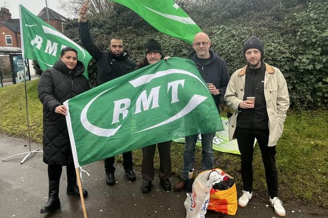 Members of the RMT union opposite the main entrance to Rugby station this morning, Tuesday, January 3.
