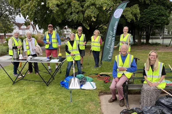 Volunteers enjoying a coffee and cake after their work. Photo credit: David Chantrey.