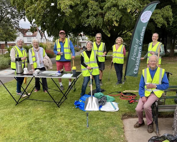 Volunteers enjoying a coffee and cake after their work. Photo credit: David Chantrey.