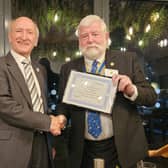 President Dick Dixon presents the award to Tony Britton
