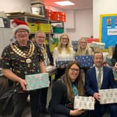 The Mayor of Whitnash Simon Button, Mayor of Leamington Alan Boad, Abby and Liss from Child friendly Warwickshire, the Mayor of Warwick Oliver Jacques and store manager Rob Apted and operations manager Dave Jones with community champion Alex Pearson. Photo supplied