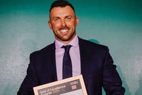 Dave Butterly with his award win