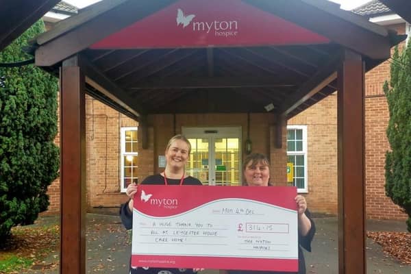 The community at the Leycester House care home in Warwick has helped raise more than £300 for the Myton Hospices.
Left to right shows: Laura Eaton, a representative from the Myton Hospices receiving a cheque from Rachel Devey, Leycester House’s activities co-ordinator. Photo supplied